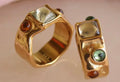 Ring, pink and green stones