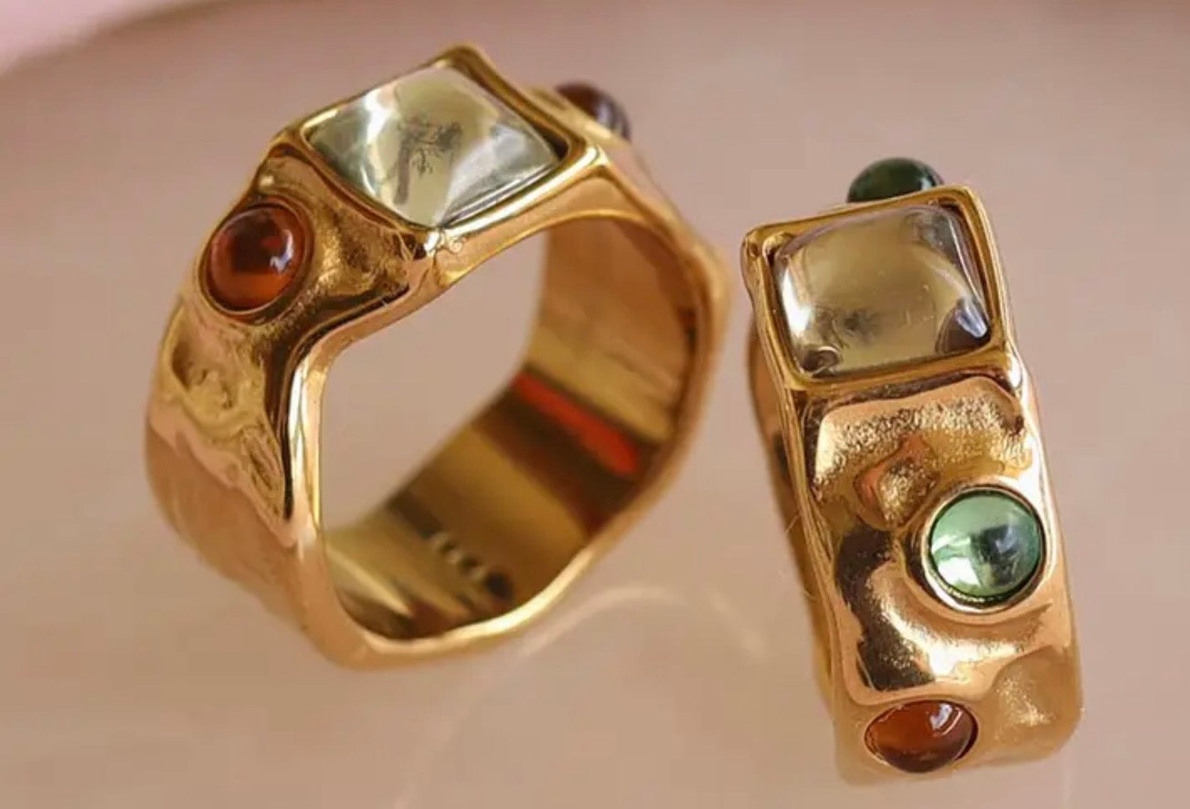 Ring, pink and green stones