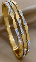 Gold colored and Crystal hinged bracelet