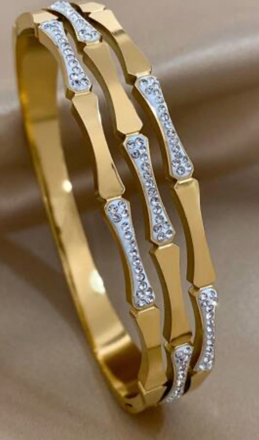 Gold colored and Crystal hinged bracelet